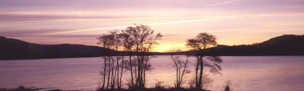 Winter sunset over Loch Lomond, near the village of Balmaha in the clan lands of Clan Buchanan. Looking over the Loch to the land of Clan Colquhoun.