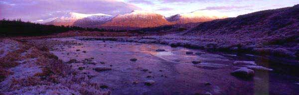 Winter twilight near Bridge of Orchy. Looking at three Munros (mountains over three thousand feet), Stob Coir' An   Albannaich, Stob Ghabhar, ClachLeathad. Lands with connections to Clan Campbell, Clan Henderson & Clan MacIntyre.